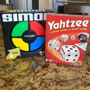 Brand new unopened boxes- Simon and Yahtzee